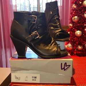 Woman’s Peek-a-boo toe Heeled Bootie